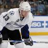 UNIONDALE, NY - FEBRUARY 13:  Alex Tanguay #13 of the Tampa Bay Lightning skates against the New York Islanders on February 13, 2010 at Nassau Coliseum in Uniondale, New York. The Isles defeated the Lightning 5-4.  (Photo by Jim McIsaac/Getty Images)