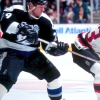 2000 Season: New Jersey's Dave Andreychuk carries puck into Lightning territory aroundTampa's Alexander Selivanov.  (Photo by Jim Leary/Getty Images)