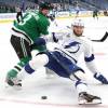 EDMONTON, ALBERTA - SEPTEMBER 28: John Klingberg #3 of the Dallas Stars trips Alexander Volkov #92 of the Tampa Bay Lightning as they pursue the puck into the corner in the first period of Game Six of the NHL Stanley Cup Final between the Tampa Bay Lightning and the Dallas Stars at Rogers Place on September 28, 2020 in Edmonton, Alberta, Canada. Klingberg was penalized for tripping on the play. (Photo by Dave Sandford/NHLI via Getty Images)