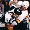 6704.39-Gino-Odjick-fighting-Tampa-Bays-Basil-McRae