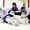 PITTSBURGH, PA - MAY 13:  Ben Bishop #30 of the Tampa Bay Lightning is looked over by a team physician after a play at the net during the first period against the Pittsburgh Penguins in Game One of the Eastern Conference Final during the 2016 NHL Stanley Cup Playoffs on May 13, 2016 in Pittsburgh, Pennsylvania.  (Photo by Justin K. Aller/Getty Images)