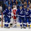 TAMPA, FL - APRIL 16: Brian Boyle #11 of the Tampa Bay Lightning (C) celebrates his goal with Victor Hedman #77 and Cedric Paquette #13 in front of Petr Mrazek #34 of the Detroit Red Wings in Game One of the Eastern Conference Quarterfinals during the 2015 NHL Stanley Cup Playoffs at Amalie Arena on April 16, 2015 in Tampa, Florida. (Photo by Mike Carlson/Getty Images)