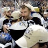 Tampa Bay Lightning captain Dave Andreychuk, center, is embraced by the Lightning'sTim Taylor following the teams 2-1 game 7 win over the Philadelphia Flyers on Saturday, May 22, 2004 in Tampa, Fla. (Photo Scott Audette/Tampa Bay Lightning)