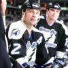 BOSTON, MA - 1990's: Dino Ciccarelli #22 of the Tampa Bay Lightning watches action from bench in game against the Boston Bruins at the Fleet Center  (Photo by Steve Babineau/NHLI via Getty Images)