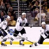 BOSTON, MA - MAY 17:  Dominic Moore #19 of the Tampa Bay Lightning celebrates his third period goal against the Boston Bruins with teammates in Game Two of the Eastern Conference Finals during the 2011 NHL Stanley Cup Playoffs at TD Garden on May 17, 2011 in Boston, Massachusetts.  (Photo by Bruce Bennett/Getty Images)