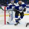 TAMPA, FL - MARCH 18: Erik Cernak #81 and Goalie Andrei Vasilevskiy #88 of the Tampa Bay Lightning skate against the Chicago Blackhawks during the second period at Amalie Arena on March 18, 2021 in Tampa, Florida. (Photo by Scott Audette /NHLI via Getty Images)