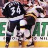 3.21.00  Tampa Bay Lightning's Gordie Dwyer checks Don Sweeney right into his teammates during first period action last night at the FleetCenter.  Staff photo by Bill Belknap.  Saved in photo6 and wed (Photo by Boston Herald/MediaNews Group/Boston Herald via Getty Images)