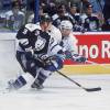 30 Oct 2001:  Right wing  Mikael Renberg #19 of the Toronto Maple Leafs battles for position against defenseman Grant Ledyard #3 of the Tampa Bay Lightning during the NHL game at Air Canada Centre in Toronto, Canada.  The Maple Leafs defeated the Lightning 3-2.  Mandatory Credit:  Dave Sanford /Allsport