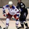 TRAVERSE CITY, MI - SEPTEMBER 16:  Artem Anisimov #55 of the New York Rangers spins off after the face off with James Wright #43 of the Tampa Bay Lightning during the 2008 NHL Prospects Tournament on September 16, 2008 at Centre Ice Arena in Traverse City, Michigan.  (Photo by Dave Reginek/NHLI via Getty Images)