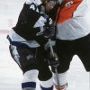 01 Dec 2001: Defenseman Chris Therien #6 of the Philadelphia Flyers delivers an open ice check to left wing Jimmie Olvestad #41 of the Tampa Bay Lightning during the NHL game at the First Union Center in Philadelphia, Pennsylvania.  The Flyers shut out the Lightning 2-0.  Mandatory Credit:  Ezra Shaw/Getty Images/NHLI