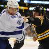 BOSTON, MA - APRIL 25: Keith Aulie #3 of the Tampa Bay Lightning fights against Milan Lucic #17 of the Boston Bruins at the TD Garden on April 25, 2013 in Boston, Massachusetts.  (Photo by Steve Babineau/NHLI via Getty Images)