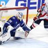 TAMPA, FL - MAY 11:  Lars Eller #20 of the Washington Capitals shoots the puck against Louis Domingue #70 of the Tampa Bay Lightning during the third period in Game One of the Eastern Conference Finals during the 2018 NHL Stanley Cup Playoffs at Amalie Arena on May 11, 2018 in Tampa, Florida.  (Photo by Mike Carlson/Getty Images)