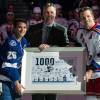 TAMPA, FL - NOVEMBER 25: Martin St. Louis #26 of the Tampa Bay Lightning is presented with a commemorative plaque celebrating his 1,000th NHL game from former teammates Dave Andreychuk and Brad Richards #19 of the New York Rangers prior to the start of the game at the Tampa Bay Times Forum on November 25, 2013 in Tampa, Florida.  (Photo by Scott Audette/NHLI via Getty Images)