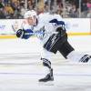 BOSTON - DECEMBER 2:  Matt Walker #8 of the Tampa Bay Lightning shoots the puck during the game against the Boston Bruins at the TD Garden on December 2, 2009 in Boston, Massachusetts.  (Photo by Brian Babineau/NHLI via Getty Images)