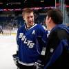 TAMPA, FL - DECEMBER 5:  Mattias Ohlund #5 of the Tampa Bay Lightning with Ray Thill team equipment manager before the start of the game against the New York Islanders at the St. Pete Times Forum on December 5, 2009 in Tampa, Florida. (Photo by Scott Audette/NHLI via Getty Images)