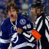 TAMPA, FL - APRIL 15:  Michael Blunden #46 of the Tampa Bay Lightning is escorted off the ice by referee Francois St. Laurent #38 during the third  period in Game Two of the Eastern Conference Quarterfinals during the 2016 NHL Stanley Cup Playoffs at Amalie Arena on April 15, 2016 in Tampa, Florida. (Photo by Mike Carlson/Getty Images)