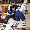 TORONTO, ON - FEBRUARY 21: Michel Petit #95 of the Tampa Bay Lightning skates against Darby Hendrickson #16 of the Toronto Maple Leafs during NHL game action on February 21, 1996 at Maple Leaf Gardens in Toronto, Ontario, Canada. (Photo by Graig Abel/Getty Images)