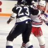 NEW YORK, NY - NOVEMBER 9:  Tie Domi #28 of the New York Rangers fights with Mike Hartman #23 of the Tampa Bay Lightning on November 9, 1992 at the Madison Square Garden in New York, New York.  (Photo by B Bennett/Bruce Bennett Studios via Getty Images Studios/Getty Images)