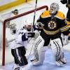 BOSTON - MAY 17: Game two of the Eastern Conference final, Tampa's Nate Thompson reacts to teammate Adam Hall's first period goal past Bruins goalie Tim Thomas. (Photo by John Tlumacki/The Boston Globe via Getty Images)