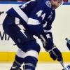 TAMPA, FL - NOVEMBER 22: Center Tim Connolly #12 of the Toronto Maple Leafs faces off against center Nate Thompson #44 of the Tampa Bay Lightning  November 22, 2011 at St. Pete Times Forum in Tampa, Florida.  Connolly scored a first-period goal and Toronto won 7 - 1. (Photo by Al Messerschmidt/Getty Images)