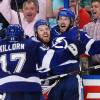 TAMPA, FL - MAY 20: Nikita Kucherov #86 of the Tampa Bay Lightning celebrates with his teammate Nikita Nesterov #89 and Alex Killorn #17 after scoring the game winning goal in overtime to defeat the New York Rangers 6 to 5 in Game Three of the Eastern Conference Finals during the 2015 NHL Stanley Cup Playoffs at Amalie Arena on May 20, 2015 in Tampa, Florida. (Photo by Bruce Bennett/Getty Images)