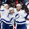 OTTAWA, ON - JANUARY 04: Tampa Bay Lightning Winger Tyler Johnson (9) celebrates his goal with Tampa Bay Lightning Left Wing Ondrej Palat (18) and Tampa Bay Lightning Center Anthony Cirelli (71) during third period National Hockey League action between the Tampa Bay Lightning and Ottawa Senators on January 4, 2020, at Canadian Tire Centre in Ottawa, ON, Canada. (Photo by Richard A. Whittaker/Icon Sportswire via Getty Images)