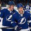 TAMPA, FL - NOVEMBER 29: Ondrej Palat #18 and Tyler Johnson #9 of the Tampa Bay Lightning talk during the pre game warmups prior to the game against the Pittsburgh Penguins at the Tampa Bay Times Forum on November 29, 2013 in Tampa, Florida.  (Photo by Scott Audette/NHLI via Getty Images)