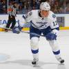 UNIONDALE, NY - OCTOBER 13: Pavel Kubina #13 of the Tampa Bay Lightning skates against the New York Islanders on October 13, 2011 at Nassau Coliseum in Uniondale, New York. Islanders defeated the Lightning 5-1.  (Photo by Mike Stobe/NHLI via Getty Images)