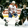 Canadiens captain Vincent Damphousse #25 stakes his claim to the front of the Lightning net between goaltender Rick Tabaracci #31 and defenceman Leif Rohlin #27 in a game at the Molson Centre during the 1996-97 season (Photo by Denis Brodeur/NHLI via Getty Images)