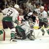 1 Dec 1999:  Guy Hebert #31 of the Anaheim Mighty Ducks blocks the puck as Robert Petrovicky #14 of the Tampa Bay Lightning tries to score at the Arrowhead Pond in Anaheim, California. The Lightning defeated the Ducks 4-2. Mandatory Credit: Kellie Landis  /Allsport