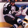 3.21.00  Bruin Eric Nickulas escapes a check with control of the puck as Tampa Bay Lightning Robert Petrovicky falls to the ice during first period action last night at the FleetCenter.  Staff photo by Bill Belknap.  Saved in photo6 and wed (Photo by Boston Herald/MediaNews Group/Boston Herald via Getty Images)