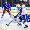 NEW YORK, NY - NOVEMBER 17:  Ryan Callahan #24 of the Tampa Bay Lightning skates around Henrik Lundqvist #30 of the New York Rangers before scoring a goal in the third period at Madison Square Garden on November 17, 2014 in New York City.  (Photo by Alex Goodlett/Getty Images)