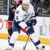 COLUMBUS, OH - DECEMBER 3: Sami Salo #6 of the Tampa Bay Lightning skates with the puck against the Columbus Blue Jackets on December 3, 2013 at Nationwide Arena in Columbus, Ohio. (Photo by Jamie Sabau/NHLI via Getty Images)