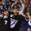 TAMPA, FL - MAY 25:  Teddy Purcell #16 celebrates his second period goal with Brett Clark #7 of the Tampa Bay Lightning in Game Six of the Eastern Conference Finals against the Boston Bruins during the 2011 NHL Stanley Cup Playoffs at St Pete Times Forum on May 25, 2011 in Tampa, Florida.  (Photo by Eliot J. Schechter/Getty Images)