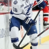 NEWARK, NJ - FEBRUARY 07:  Teddy Purcell #16 of the Tampa Bay Lightning in action against Andy Greene #6 of the New Jersey Devils at the Prudential Center on February 7, 2013 in Newark, New Jersey. The Devils defeated the Lightning 4-2.  (Photo by Jim McIsaac/Getty Images)