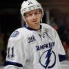 UNIONDALE, NY - JANUARY 21:  Tom Pyatt #11 of the Tampa Bay Lightning skates against the New York Islanders at the Nassau Veterans Memorial Coliseum on January 21, 2013 in Uniondale, New York.  (Photo by Bruce Bennett/Getty Images)