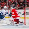 DETROIT, MI - APRIL 23:  Tyler Johnson #9 of the Tampa Bay Lightning scores on goalie Petr Mrazek #34 of the Detroit Red Wings in Game Four of the Eastern Conference Quarterfinals during the 2015 NHL Stanley Cup Playoffs on April 23, 2015 at Joe Louis Arena in Detroit, Michigan. (Photo by Dave Reginek/NHLI via Getty Images)