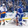 TAMPA, FL - APRIL 30: Tyler Johnson #9 of the Tampa Bay Lightning celebrates his goal against Travis Hamonic #3 and goalie Thomas Greiss #1 of the New York Islanders during the first period of Game Two of the Eastern Conference Second Round in the 2016 NHL Stanley Cup Playoffs at the Amalie Arena on April 30, 2016 in Tampa, Florida.  (Photo by Scott Audette/NHLI via Getty Images)