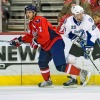 WASHINGTON, DC - March 27, 2009:  Washington Capitals defenseman Brian Pothier (#2) takes a check from Tampa Bay Lightning forward Vaclav Prospal (#20) during their NHL ice hockey game at Verizon Center.