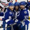 TAMPA, FL - JUNE 13:  Valtteri Filppula #51 of the Tampa Bay Lightning celebrates with his teammates Alex Killorn #17 and Steven Stamkos #91 after scoring a second period goal against Corey Crawford #50 of the Chicago Blackhawks during Game Five of the 2015 NHL Stanley Cup Final at Amalie Arena on June 13, 2015 in Tampa, Florida.  (Photo by Mike Carlson/Getty Images)