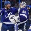 TAMPA, FL - APRIL  3: Victor Hedman #77 celebrates with Andrei Vasilevskiy #88 of the Tampa Bay Lightning after shutting out the Boston Bruins during the third period of the game at the Amalie Arena on April 3, 2018 in Tampa, Florida. (Photo by Mike Carlson/Getty Images)