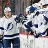 PHILADELPHIA, PA - NOVEMBER 17: Adam Erne #73 of the Tampa Bay Lightning celebrates his second period power-play goal against the Philadelphia Flyers with his teammates on the bench on November 17, 2018 at the Wells Fargo Center in Philadelphia, Pennsylvania.  (Photo by Len Redkoles/NHLI via Getty Images)