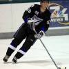 TRAVERSE CITY, MI - SEPTEMBER 16:  Michael Ward #59 of the Tampa Bay Lightning skates up ice with the puck during the 2008 NHL Prospects Tournament on September 16, 2008 at Centre Ice Arena in Traverse City, Michigan.  (Photo by Dave Reginek/NHLI via Getty Images)